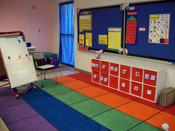 A before picture of the whole-group area with a large math board